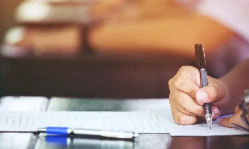 Student working on High School Equivalency exam